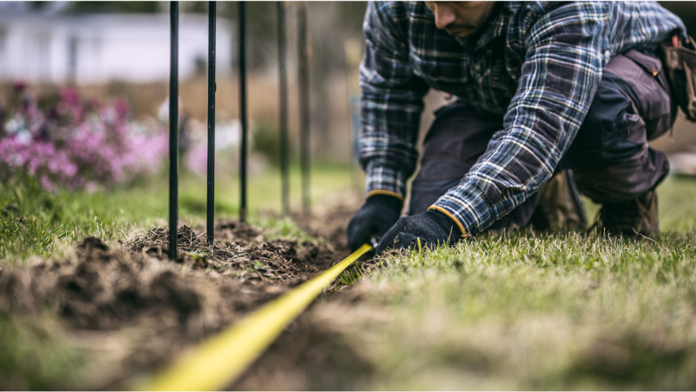 How Do Installers Measure Property Lines for Custom Fences?
